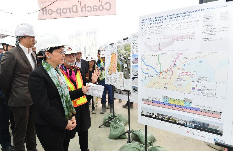 The Chief Executive, Mrs Carrie Lam (second left), accompanied by the Secretary for Development, Mr Michael Wong and the Under Secretary for Security, Mr Sonny Au, inspected the Liantang/Heung Yuen Wai Boundary Control Point (BCP) project today (March 14) to learn about the latest situation of the cross-boundary infrastructure project. Photo shows Mrs Lam being briefed by the Director of Architectural Services, Mrs Sylvia Lam (third left), on the BCP building and associated facilities.