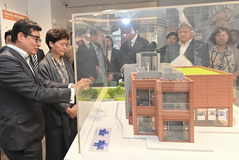 The Chief Executive, Mrs Carrie Lam, accompanied by the Secretary for Development, Mr Michael Wong, visited the Modular Integrated Construction (MiC) Display Centre at the Zero Carbon Building complex in Kowloon Bay this afternoon (March 15). Photo shows Mrs Lam (second left) being briefed by the Executive Director of the Construction Industry Council, Mr Albert Cheng (first left), on the centre, which was built with MiC modules.
