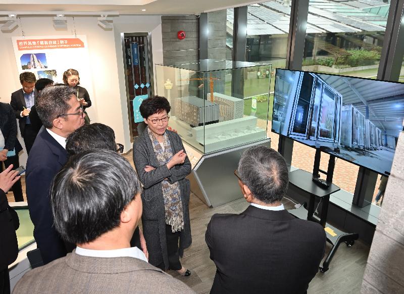 The Chief Executive, Mrs Carrie Lam (second right), accompanied by the Secretary for Development, Mr Michael Wong (first left), visited the Modular Integrated Construction Display Centre at the Zero Carbon Building complex in Kowloon Bay this afternoon (March 15). Photo shows Mrs Lam being briefed by a representative of the Construction Industry Council on the design and construction process of the display centre.