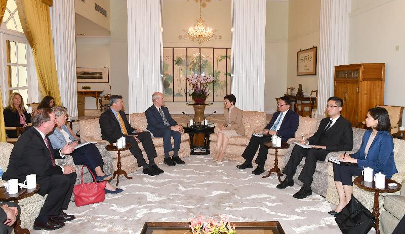 The Chief Executive, Mrs Carrie Lam (fourth right), accompanied by the Acting Secretary for Commerce and Economic Development, Dr Bernard Chan (second right), met with the visiting Co-Chairs of the Congressional US-China Working Group (USCWG), Mr Rick Larsen (fourth left) and Mr Darin LaHood (third left), and four members of the USCWG at Government House this morning (March 18). 