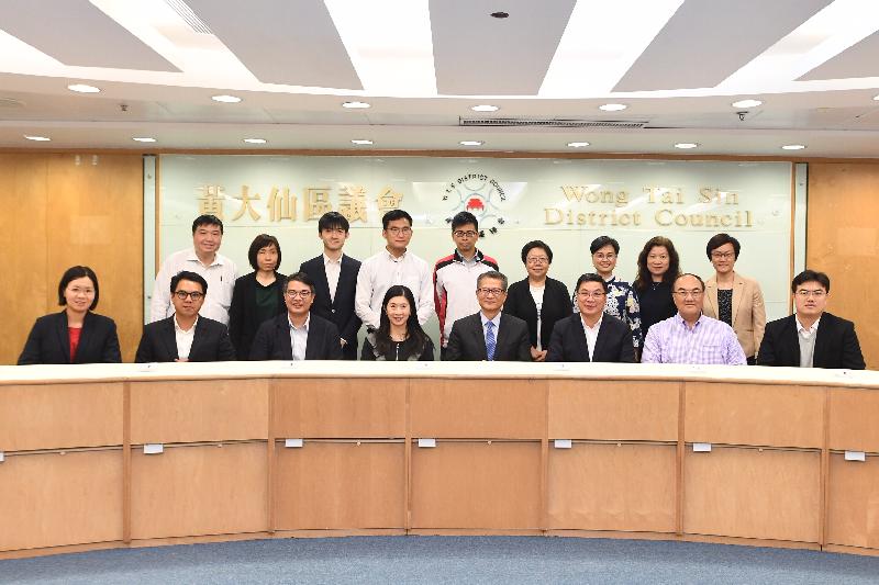The Financial Secretary, Mr Paul Chan, today (March 20) met with members of the Wong Tai Sin District Council (WTSDC) to exchange views on various livelihood and development issues of the district. Mr Chan (front row, fourth right) is pictured with the Chairman of the WTSDC, Mr Li Tak-hong (front row, third right); the District Officer (Wong Tai Sin), Ms Annie Kong (front row, fourth left); and WTSDC members.