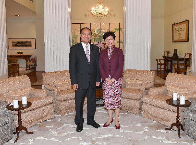 The Chief Executive, Mrs Carrie Lam (right), meets the Secretary-General of the International Telecommunication Union, Mr Zhao Houlin (left), at Government House this afternoon (March 20).