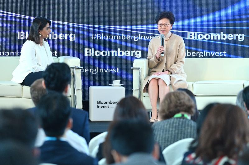 The Chief Executive, Mrs Carrie Lam (right), answers questions at the Bloomberg Invest Asia Summit today (March 21).