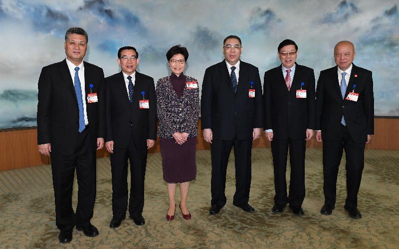 The Chief Executive, Mrs Carrie Lam, attended a session entitled "The Guangdong-Hong Kong-Macao Greater Bay Area: A Rising Star in the Global Economy" at the China Development Forum 2019 held at the Diaoyutai State Guesthouse in Beijing today (March 25). From left: the Governor of Guangdong Province, Mr Ma Xingrui; the Vice-President of the Development Research Centre of the State Council, Mr Wang Anshun; Mrs Lam; the Chief Executive of the Macao Special Administrative Region, Mr Chui Sai-on; the President of the Development Research Centre of the State Council, Mr Li Wei; and the Vice Chairman and Secretary General of the China Development Research Foundation, Mr Lu Mai, are pictured before attending the session.