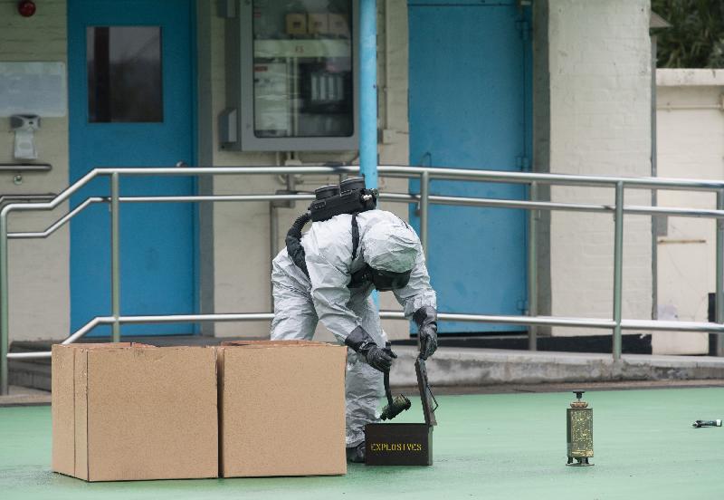 The first inter-departmental counter-terrorism exercise "Powersky" organised by the Inter-departmental Counter Terrorism Unit (ICTU) set up by the Security Bureau was held this afternoon (March 25) at Lei Yue Mun Park. Picture shows the Explosive Ordnance Disposal Bureau of the Hong Kong Police Force diffusing chemical, biological, radiological and nuclear leakage. 