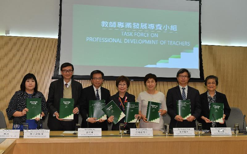 The Chairman of the Task Force on Professional Development of Teachers, Dr Carrie Willis (centre), briefed the media on the review report released by the Task Force today (March 26). She is pictured with Task Force members Ms Ng Tan (first left), Professor John Lee (second left), Mr So Ping-fai (third left), Mrs Michelle Wong (third right), Mr Lau Chi-yuen (second right) and Ms Kwan Wai-fong (first right).