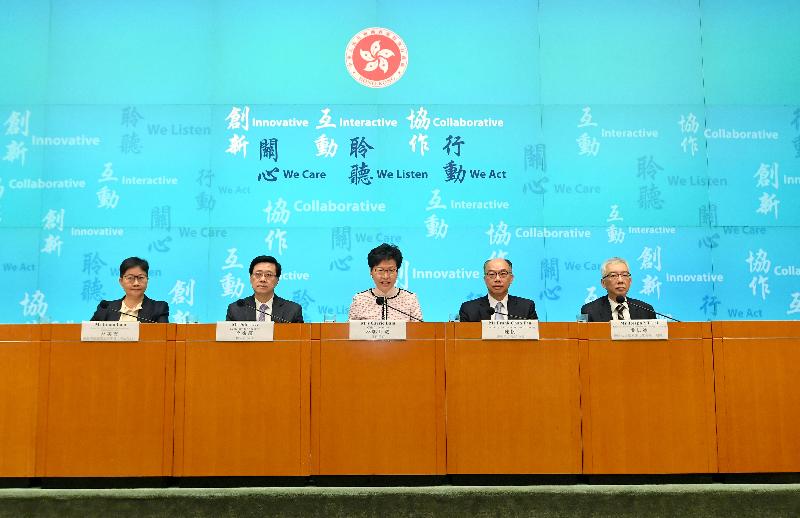 The Chief Executive, Mrs Carrie Lam (centre), holds a press conference today (March 26) on the interim report of the Commission of Inquiry into the Construction Works at and near the Hung Hom Station Extension under the Shatin to Central Link Project, the toll adjustment proposal for traffic rationalisation among the three road harbour crossings, and the proposed amendments to the Fugitive Offenders Ordinance and the Mutual Legal Assistance in Criminal Matters Ordinance. Also present are the Secretary for Security, Mr John Lee (second left); the Secretary for Transport and Housing, Mr Frank Chan Fan (second right); the Permanent Secretary for Transport and Housing (Transport), Mr Joseph YT Lai (first right); and the Deputy Law Officer (Mutual Legal Assistance) of the Department of Justice, Ms Linda Lam (first left). 