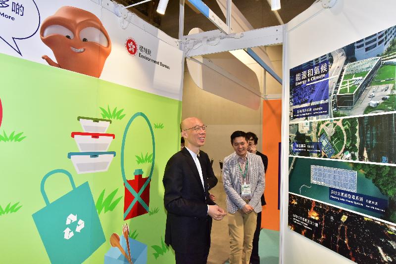 The Secretary for the Environment, Mr Wong Kam-sing (left), tours the booth hosted by the Environment Bureau at the 2019 Macao International Environmental Co-operation Forum & Exhibition in Macao today (March 28).