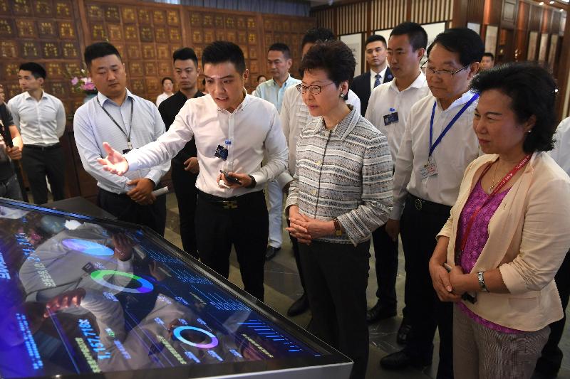 The Chief Executive, Mrs Carrie Lam, visited the Boao Lecheng International Medical Tourism Pilot Zone to learn about its operation during the Boao Forum for Asia Annual Conference 2019 in Hainan today (March 29). Photo shows Mrs Lam (fourth right) being briefed by staff on the operation of the Traditional Chinese Medicine hosipital in the Pilot Zone.