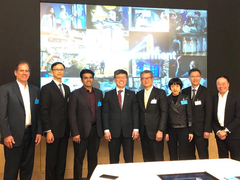 The Financial Secretary, Mr Paul Chan (fourth right), today (April 8, US West Coast time) visited Microsoft in Seattle. Mr Chan is pictured with the Executive Vice President of Microsoft's Artificial Intelligence and Research Group, Dr Harry Shum (fourth left); the Director of the Hong Kong Economic and Trade Office, San Francisco, Mr Ivanhoe Chang (second left); and the Hong Kong Commissioner for Economic and Trade Affairs, USA, Mr Eddie Mak (second right). 