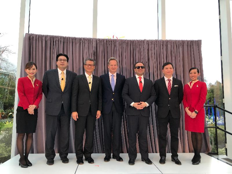 The Financial Secretary, Mr Paul Chan, today (April 8, US West Coast time) attended the Cathay Pacific Seattle Launch Gala Reception in Seattle. Mr Chan (third left) is pictured with the Lieutenant Governor of Washington State, Mr Cyrus Habib (third right); the Senior Deputy Mayor of Seattle, Mr Michael Fong (second left); the Chief Executive Officer of Cathay Pacific, Mr Rupert Hogg (centre); and the Chief Customer and Commercial Officer of Cathay Pacific, Mr Paul Loo (second right).
