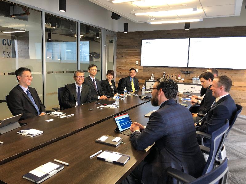 The Financial Secretary, Mr Paul Chan (second left), today (April 9, US West Coast time) meets with management representatives of PitchBook in Seattle. Also present are the Director of the Hong Kong Economic and Trade Office, San Francisco, Mr Ivanhoe Chang (third left), and the Hong Kong Commissioner for Economic and Trade Affairs, USA, Mr Eddie Mak (first left).