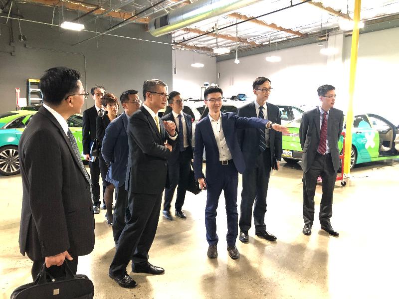 The Financial Secretary, Mr Paul Chan (front row, second left), today (April 10, US West Coast time) visits AutoX in San Francisco and receives a briefing from a representative there on the latest developments of autonomous driving technology.