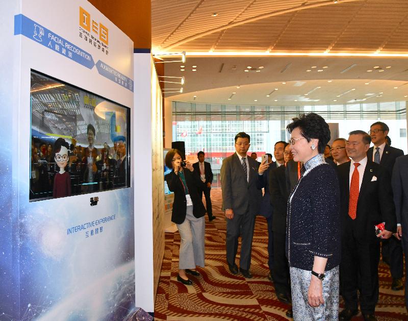 The Chief Executive, Mrs Carrie Lam, attended the Internet Economy Summit 2019 today (April 15). Photo shows Mrs Lam (front) viewing an interactive experience feature before the summit. 
