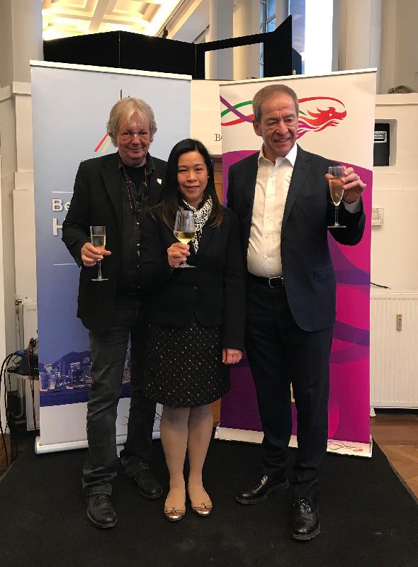 The Hong Kong Economic and Trade Office in Brussels (HKETO, Brussels) hosted a reception on April 17 (Brussels time) at the 37th Brussels International Fantasy, Fantastic, Thriller and Science Fiction Film Festival (BIFFF) to highlight the participation of Hong Kong films in the BIFFF. Photo shows the Deputy Representative of HKETO, Brussels, Miss Fiona Chau (centre); the Festival Director of the BIFFF, Mr Guy Delmote (left); and the Chairman of the Belgium Hong Kong Society, Mr Piet Steel (right), toasting at the reception with other guests.
