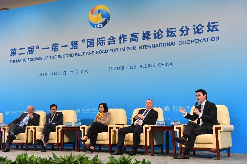 A high-level Hong Kong Special Administrative Region delegation led by the Chief Executive participated in the thematic forums of the second Belt and Road Forum for International Cooperation in Beijing today (April 25). Photo shows the Secretary for Commerce and Economic Development, Mr Edward Yau (first right), delivering remarks at the thematic forum on economic and trade co-operation zone promotion.
