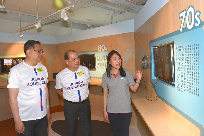 The Chief Secretary for Administration, Mr Matthew Cheung Kin-chung, attended the launching ceremony of the Junior Police Call 45th Anniversary Open Day at JPC@Pat Heung today (April 28). Photo shows Mr Cheung (centre) and the Commissioner of Police, Mr Lo Wai-chung (first left), touring the exhibition.

