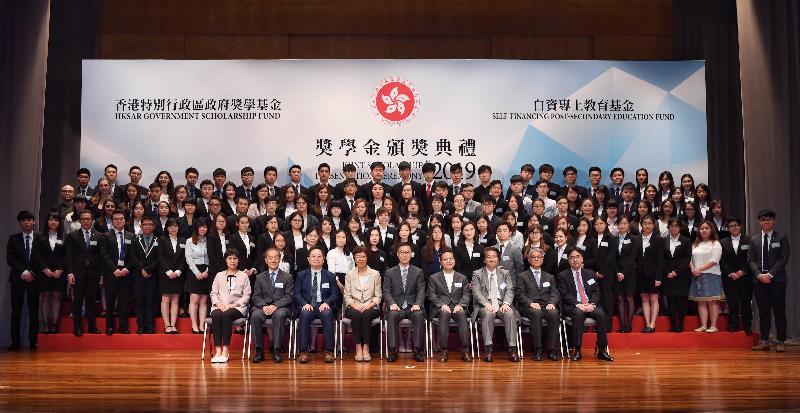 The Secretary for Education, Mr Kevin Yeung (first row, centre); the Chairman of the Committee on Self-financing Post-secondary Education, Professor Anthony Cheung (first row, fourth right); Deputy Secretary for Education, Mr Rex Chang (first row, third right); convenor of the Sub-committee on Self-financing Post-secondary Scholarship Scheme, Mrs Ruth Lee (first row, fourth left) and other guests are pictured with recipients of scholarships under the Self-financing Post-secondary Education Fund at the HKSAR Government Scholarship Fund and Self-financing Post-secondary Education Fund Joint Scholarship Presentation Ceremony today (April 30).