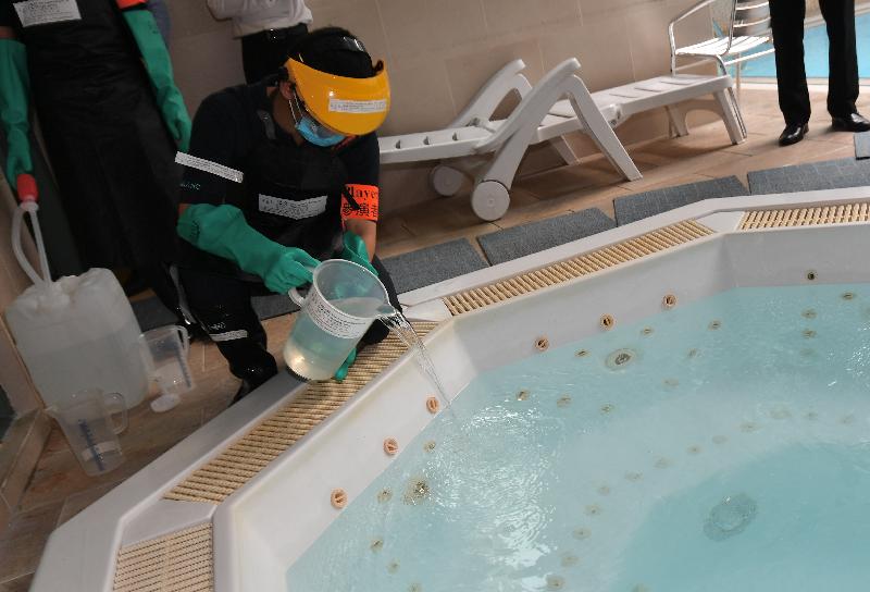 The Centre for Health Protection of the Department of Health, in collaboration with other government departments and organisations, today (April 30) held a public health exercise code-named "Zircon" at a purpose-built housing block for the elderly to test the preparedness against Legionnaires’ Disease. Photo shows disinfection being conducted at the Jacuzzi at the housing block.