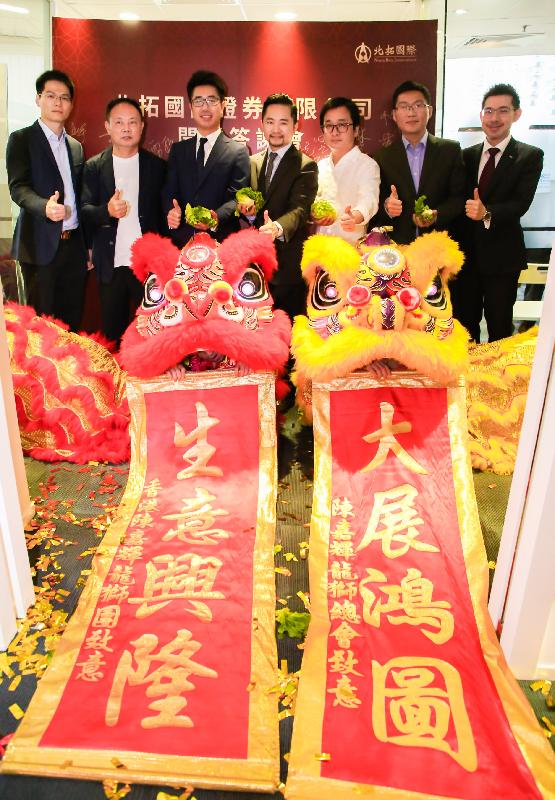 Mainland investment bank, North Beta Capital, officially opened its North Beta International Securities Limited in Hong Kong today (May 6). Photo shows (from left) the President of Qiaoxin Holding Group, Mr Huang Chaokai; the Chairman of BESTSBET Group, Mr Wu Tuping; Founding Partner of North Beta Capital, Mr Huang Shaodong; Founding Partner of North Beta Capital, Mr Jonathan Zhu; Partner of North Beta Capital, Mr Wang Shaoyan; Executive Director of North Beta Capital, Mr Layne Lei, and Associate Director-General of Investment Promotion, Dr Jimmy Chiang.

