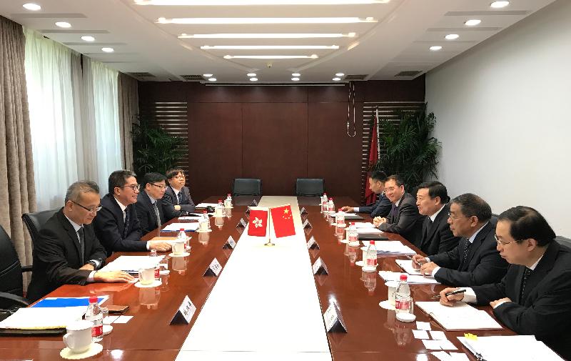 The Secretary for Development, Mr Michael Wong, started his visit programme in Beijing today (May 6). Photo shows Mr Wong (second left); the Permanent Secretary for Development (Works), Mr Lam Sai-hung (third left); and the Deputy Secretary for Development (Works), Mr Francis Chau (first left), meeting with the Vice Minister of the Ministry of Housing and Urban-Rural Development, Mr Ni Hong (third right).