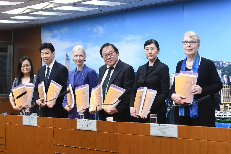 The Chairman of the Causing or Allowing the Death of a Child or Vulnerable Adult Sub-committee of the Law Reform Commission (LRC), Ms Amanda Whitfort (third left); members of the Sub-committee Dr Philip Beh (third right) and Mr Stephen Hung (second left); the Secretary of the LRC, Ms Adeline Wan (first left); Consultant Counsel to the Sub-committee, Ms Michelle Ainsworth (first right); and the Secretary to the Sub-committee, Ms Louisa Ng (second right), are pictured attending a press conference today (May 16) to release the consultation paper on causing or allowing death or serious harm of a child or vulnerable adult.