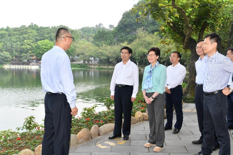 The Chief Executive, Mrs Carrie Lam, visited Zhaoqing, Guangdong today (May 17). Photo shows Mrs Lam (third left), accompanied by the Secretary of the CPC Zhaoqing Municipal Committee, Mr Lai Zehua (second left); the Mayor of the Zhaoqing Municipal Government, Mr Fan Zhongjie (fourth left); the Secretary for Constitutional and Mainland Affairs, Mr Patrick Nip (second right); and the Director General of the Hong Kong and Macao Affairs Office of the People's Government of Guangdong Province, Mr Liao Jingshan  (first right), visit the Xinghu Lake Wetland Park to learn about the progress of its water and heritage conservation projects.