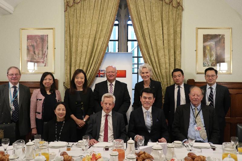 The Secretary for Commerce and Economic Development, Mr Edward Yau, had a breakfast meeting with members of the All Party Parliamentary China Group (APPCG) of the United Kingdom (UK) Parliament in London, the UK, today (May 21, London time), where he updated the participants on efforts of this term Government in forging free trade agreements (FTAs) with like-minded economies and the benefits that FTAs could bring to overseas enterprises establishing an offshoot in Hong Kong. Mr Yau (front row, second right) is pictured with the Chairman of APPCG, Mr Richard Graham (front row, second left); the Deputy Chairman of APPCG, Mr Geoffrey Clifton Brown (back row, first left); and other members of APPCG.