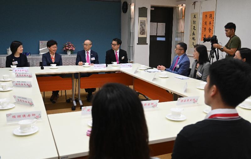 The Chief Executive, Mrs Carrie Lam, visited the Po Leung Kuk Stanley Ho Sau Nan Primary School in the Kai Tak Development Area this afternoon (May 27). Picture shows Mrs Lam (second left) and the Acting Secretary for Education, Dr Choi Yuk-lin (first left) meeting with the Chairman of Po Leung Kuk, Mr Ma Ching-nam (third left); the school supervisor, Mr David Ho (fourth left); the school principal, Ms Kam Yim-mui (sixth left), and the teaching staff.