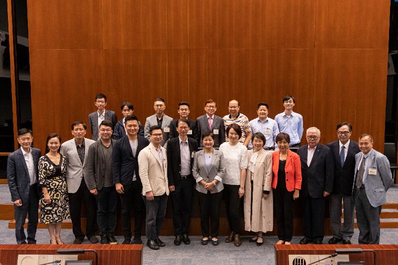 Members of the Legislative Council (LegCo) and the Kowloon City District Council are pictured after a meeting held in the LegCo Complex today (May 31).