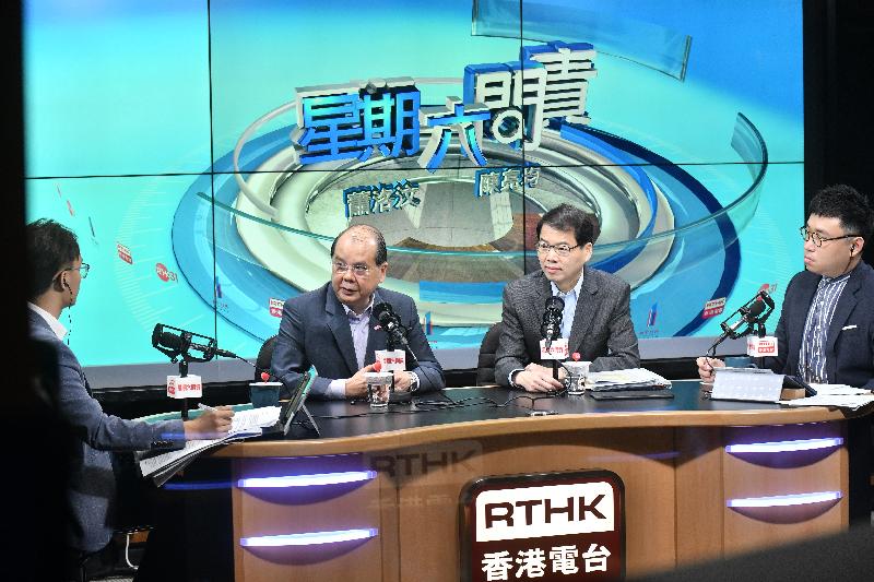 The Chief Secretary for Administration, Mr Matthew Cheung Kin-chung (second left), attends Radio Television Hong Kong's programme "Accountability" this morning (June 1).