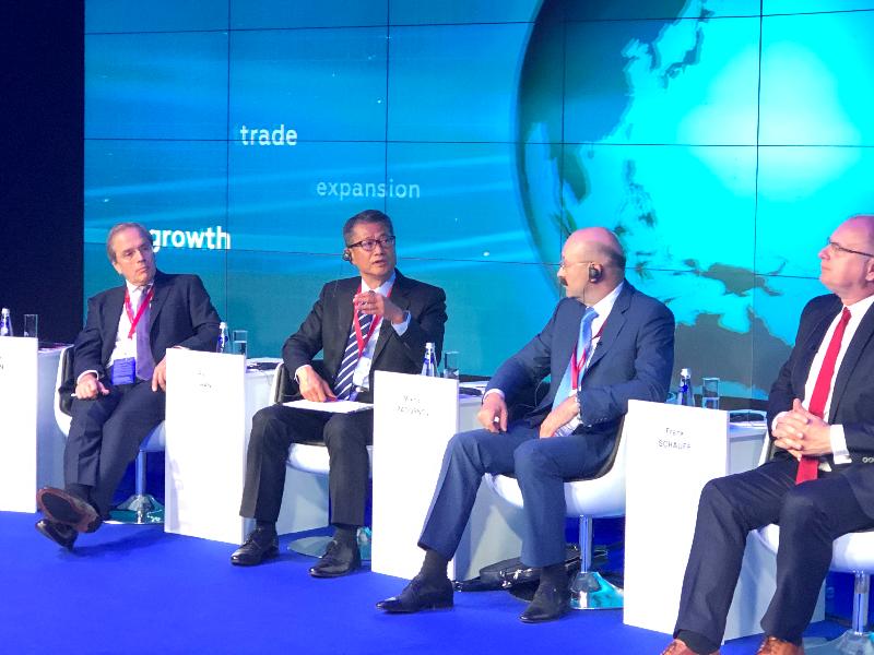 The Financial Secretary, Mr Paul Chan (second left), yesterday (June 6, St Petersburg time) attended one of the St Petersburg International Economic Forum sessions in Russia to exchange views with representatives of investment banks, trade association and rating institution on global economic order.
