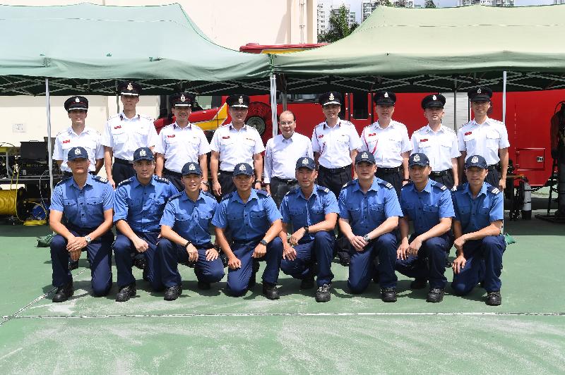 The Chief Secretary for Administration, Mr Matthew Cheung Kin-chung, visited Sha Tin Fire Station this afternoon (June 8). Photo shows Mr Cheung (back row, centre); the Director of Fire Services, Mr Li Kin-yat (back row, fourth left); and the members of the Fire Services Department’s Diving Unit. 