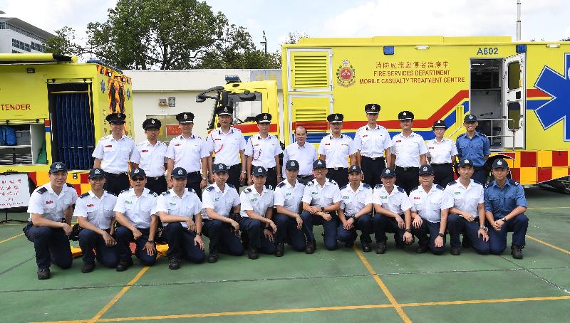 The Chief Secretary for Administration, Mr Matthew Cheung Kin-chung , visited Sha Tin Fire Station this afternoon (June 8). Photo shows Mr Cheung (back row, centre) pictured with ambulance personnel of the Fire Services Department after viewing a Mobile Casualty Treatment Centre. Also present is the Director of Fire Services, Mr Li Kin-yat (back row, fifth right).