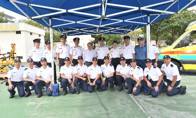 The Chief Secretary for Administration, Mr Matthew Cheung Kin-chung , visited Sha Tin Fire Station this afternoon (June 8). Photo shows Mr Cheung (back row, fifth left); the Director of Fire Services, Mr Li Kin-yat (back row, sixth left); and ambulance personnel of the Fire Services Department.