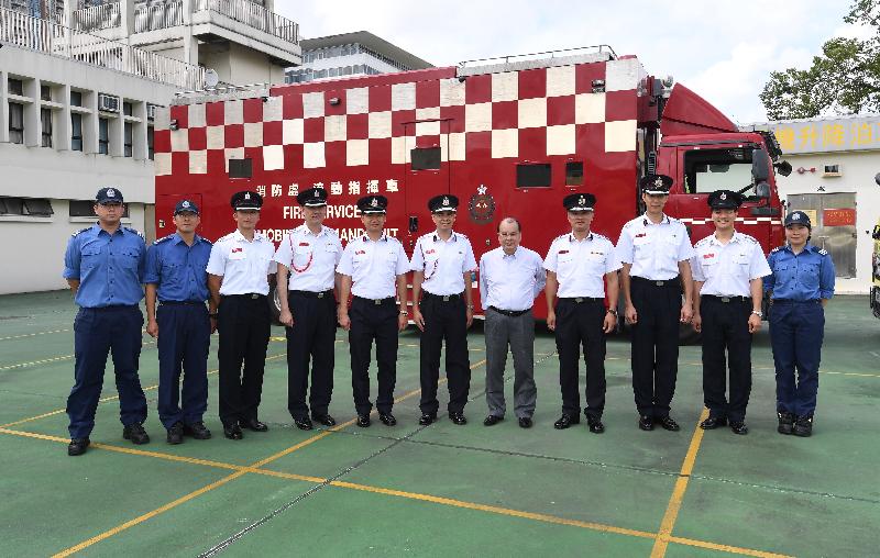 The Chief Secretary for Administration, Mr Matthew Cheung Kin-chung , visited Sha Tin Fire Station this afternoon (June 8). Photo shows Mr Cheung (fifth right); the Director of Fire Services, Mr Li Kin-yat (fourth right); and the members of the Mobilizing and Communications Group of the Fire Services Department.