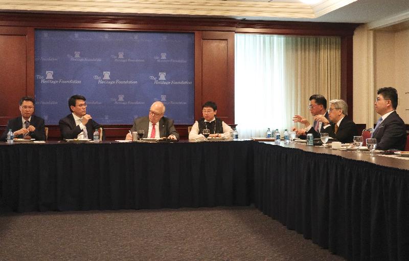 The Secretary for Commerce and Economic Development, Mr Edward Yau (second left), had a lunch meeting with senior members of the Heritage Foundation today (June 11, Eastern Standard Time) in Washington, DC, the United States. He welcomed the Foundation's high regard for Hong Kong as the world's freest economy for 25 consecutive years.
