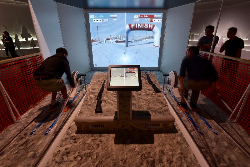 The Hong Kong Science Museum is holding a new exhibition entitled "Winter Games" from tomorrow (June 14) to October 16, offering visitors a glimpse of exciting winter sports and giving members of the public a taste what it feels like to be a winter sports athlete. Photo shows visitors experiencing simulated biathlon sports at the exhibition.  