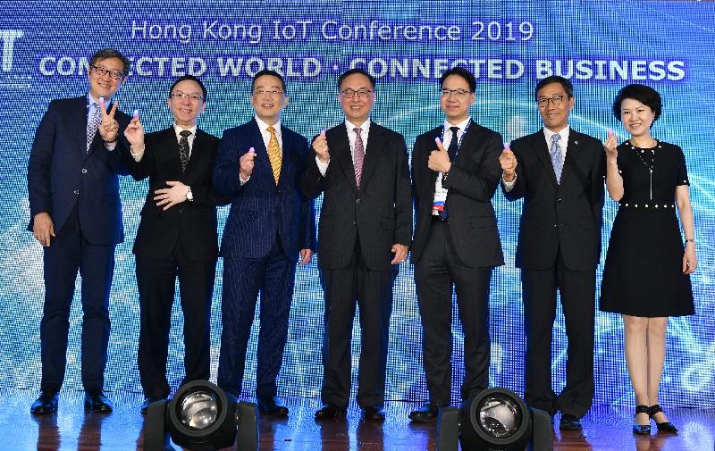 The Secretary for Innovation and Technology, Mr Nicholas W Yang (centre), joins the President of the Hong Kong Internet of Things Industry Advisory Council and Chief Information Officer of the Airport Authority Hong Kong, Mr Andy Bien (third left); Legislative Council member Mr Charles Mok (third right); the Government Chief Information Officer, Mr Victor Lam (second left); the Chief Executive Officer of the Hong Kong Science and Technology Parks Corporation, Mr Albert Wong (second right); the Chief Executive Officer of the Hong Kong Cyberport Management Company Limited, Mr Peter Yan (first left); and the Chief Executive of GS1 Hong Kong, Ms Anna Lin (first right), to officiate at the opening ceremony of the Hong Kong IoT Conference 2019 today (June 14).