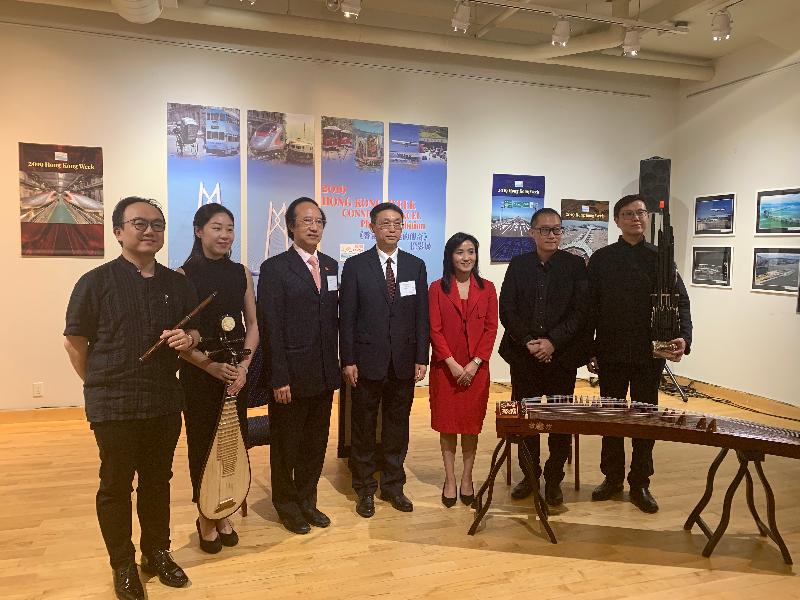 The Director of the Hong Kong Economic and Trade Office (Toronto), Ms Emily Mo, attended the opening ceremony of Hong Kong Week and the "Connect & Excel - Past, Present & Future" photo exhibition at the Dr Hin-Shiu Hung Art Gallery of the Chinese Cultural Centre of Greater Toronto yesterday (June 18, Toronto time). Photo shows Ms Mo (third right); dizi master Yeung Wai-kit (first left); pipa master Sha Jingshan (second left); the Music Director of the Hong Kong Oratorio Society, Professor Chan Wing-wah (third left); the Consul General of the People's Republic of China in Toronto, Mr Han Tao (fourth left); the Director of the Hong Kong Economic and Trade Office (Toronto), guzheng master Lau Shui-chung (second right), and sheng master Wong King-chung (first right) at the ceremony.
