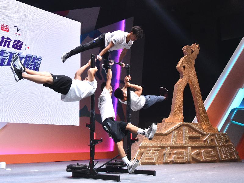 A team of energetic young people performs a street workout at the large-scale anti-drug event Fight Drugs Together 2019 today (June 22).