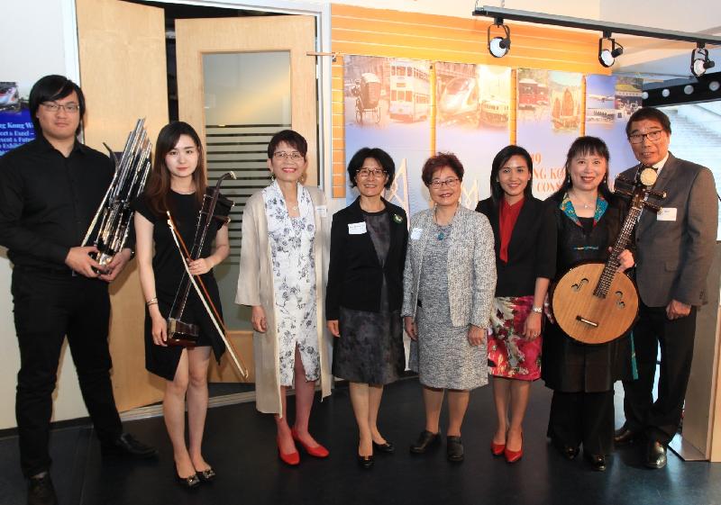 The Director of the Hong Kong Economic and Trade Office (Toronto), Ms Emily Mo, attended the opening ceremony of Hong Kong Week and the "Connect & Excel - Past, Present & Future" photo exhibition at the Sunroom and Gallery of Robson Square at the University of British Columbia in Vancouver yesterday (June 24, Vancouver time). Photo shows Ms Mo (third right); the Consul General of the People's Republic of China in Vancouver, Ms Tong Xiaoling (fourth left); the Honorary Advisor of the Chinese Canadian Photographic Society of Toronto, Mr Stephen Siu (first right); Member of Parliament of Canada Mrs Alice Wong (fourth right); Member of the Legislative Assembly of British Columbia Ms Teresa Wat (third left); and the three musicians ruan master Yu Zhimin (second right), sheng master Tim Chan (first left) and erhu master Jiang Sichen (second left) at the ceremony. 