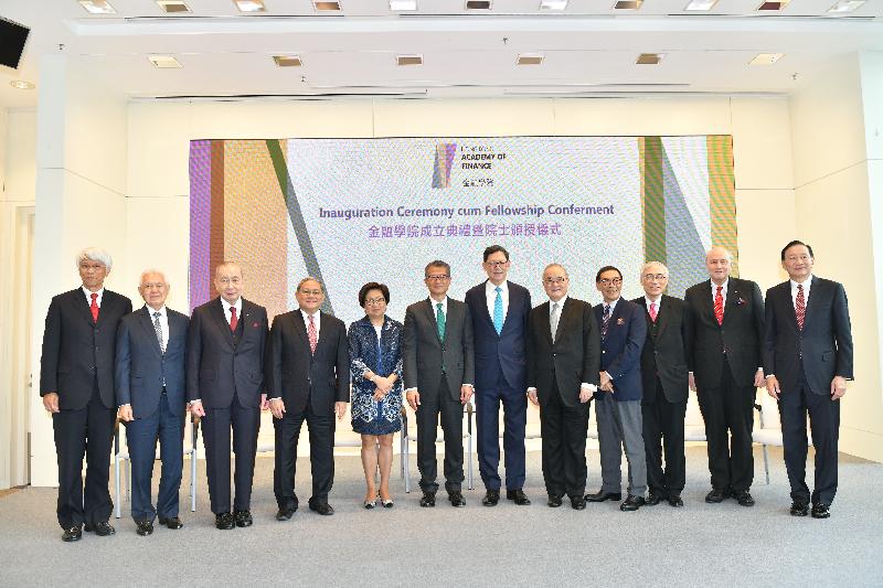 The Financial Secretary, Mr Paul Chan, attended the Hong Kong Academy of Finance (AoF) Inauguration Ceremony cum Fellowship Conferment this afternoon (June 26). Photo shows Mr Chan (sixth left), the Chief Executive of the Hong Kong Monetary Authority and the Chairman of the AoF, Mr Norman Chan (sixth right), and fellowship recipients.