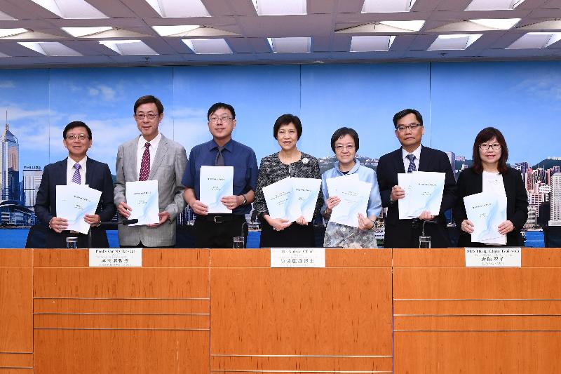 The Chairperson of the Task Force on Review of School Curriculum, Dr Anissa Chan (centre), briefed the media on the consultation document released by the Task Force and its initial recommendations today (June 28). She is pictured with Task Force members Mr Kwok Wing-keung (first left), Mr Antony Ip (second left) and Professor Ng Tai-kai (third left); Deputy Secretary for Education Mrs Hong Chan Tsui-wah (third right); Principal Assistant Secretary for Education Mr Joe Ng (second right); and Principal Education Officer Ms Gloria Chan (first right).
