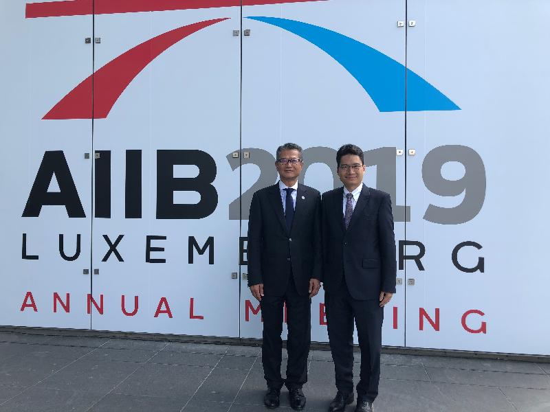 Accompanied by the Under Secretary for Financial Services and the Treasury, Mr Joseph Chan, the Financial Secretary, Mr Paul Chan (left), attended the Annual Meeting of the Asian Infrastructure Investment Bank in Luxembourg yesterday (July 12, Luxembourg time).
