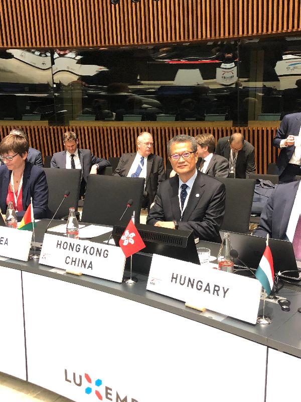 The Financial Secretary, Mr Paul Chan (front row, second left), attended the Annual Meeting of the Asian Infrastructure Investment Bank in Luxembourg yesterday (July 13, Luxembourg time).