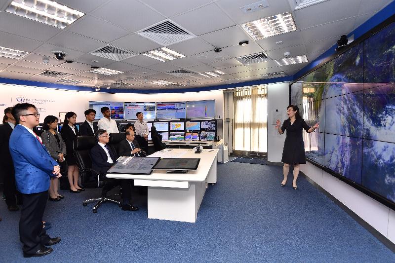The Chief Secretary for Administration, Mr Matthew Cheung Kin-chung, visited the Hong Kong Observatory (HKO) today (July 15). Photo shows Mr Cheung (front row, right), accompanied by the Director of the HKO, Mr Shun Chi-ming (front row, left), being briefed on the weather services provided by the HKO.
