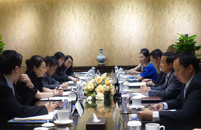 The Secretary for Justice, Ms Teresa Cheng, SC (second left), meets with the Director-General of the Department of Treaty and Law of the Ministry of Foreign Affairs, Mr Jia Guide (second right), in Beijing today (July 18).
