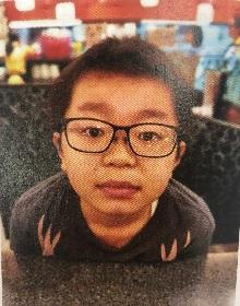 Kwong Cho-hang, aged 12, is about 1.5 metres tall, 60 kilograms in weight and of fat build. He has a round face with yellow complexion and short black hair. He has a two-inch scar on his left forearm. He was last seen wearing a red short-sleeved shirt, shorts, white sports shoes and a pair of black frame glasses grey shorts and black shoes.