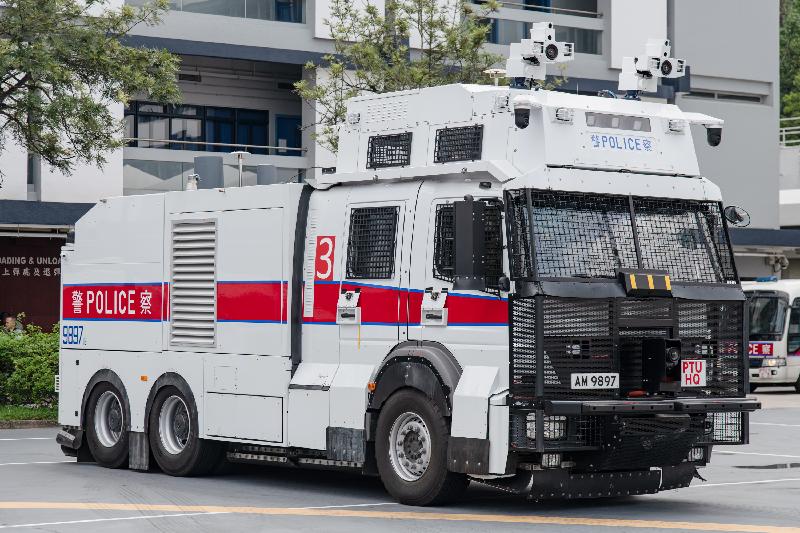 The Legislative Council (LegCo) Panel on Security conducted a visit to the Police Tactical Unit Headquarters in Fanling today (August 12) to observe a demonstration session of the specialised crowd management vehicles, commonly known as "water cannon vehicles". Photo shows a water cannon vehicle equipped with a water tank and a pelargonic acid vanillylamide solution storage device, as well as two water discharge devices on its top.